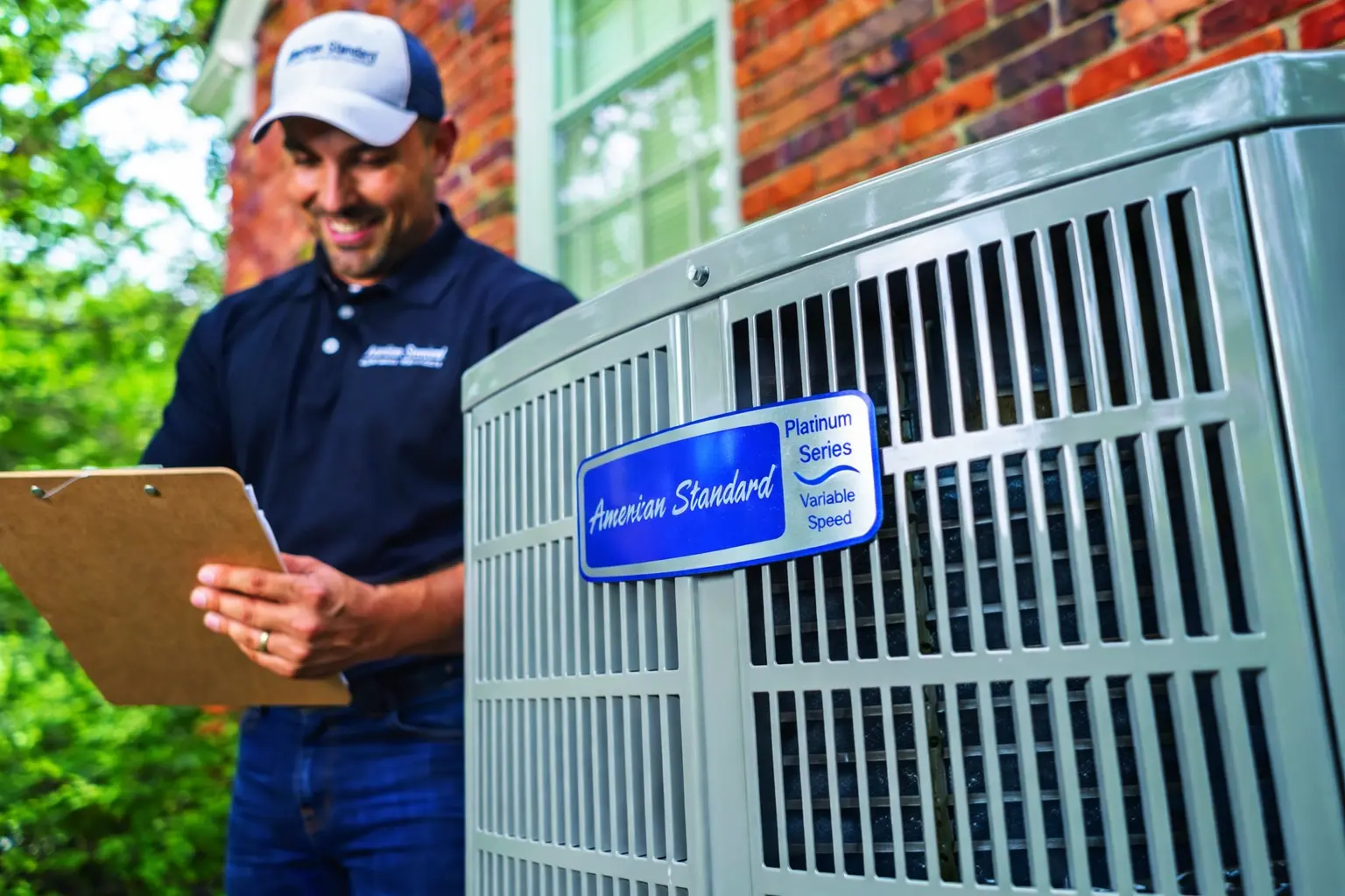 HVAC technician with air conditioner