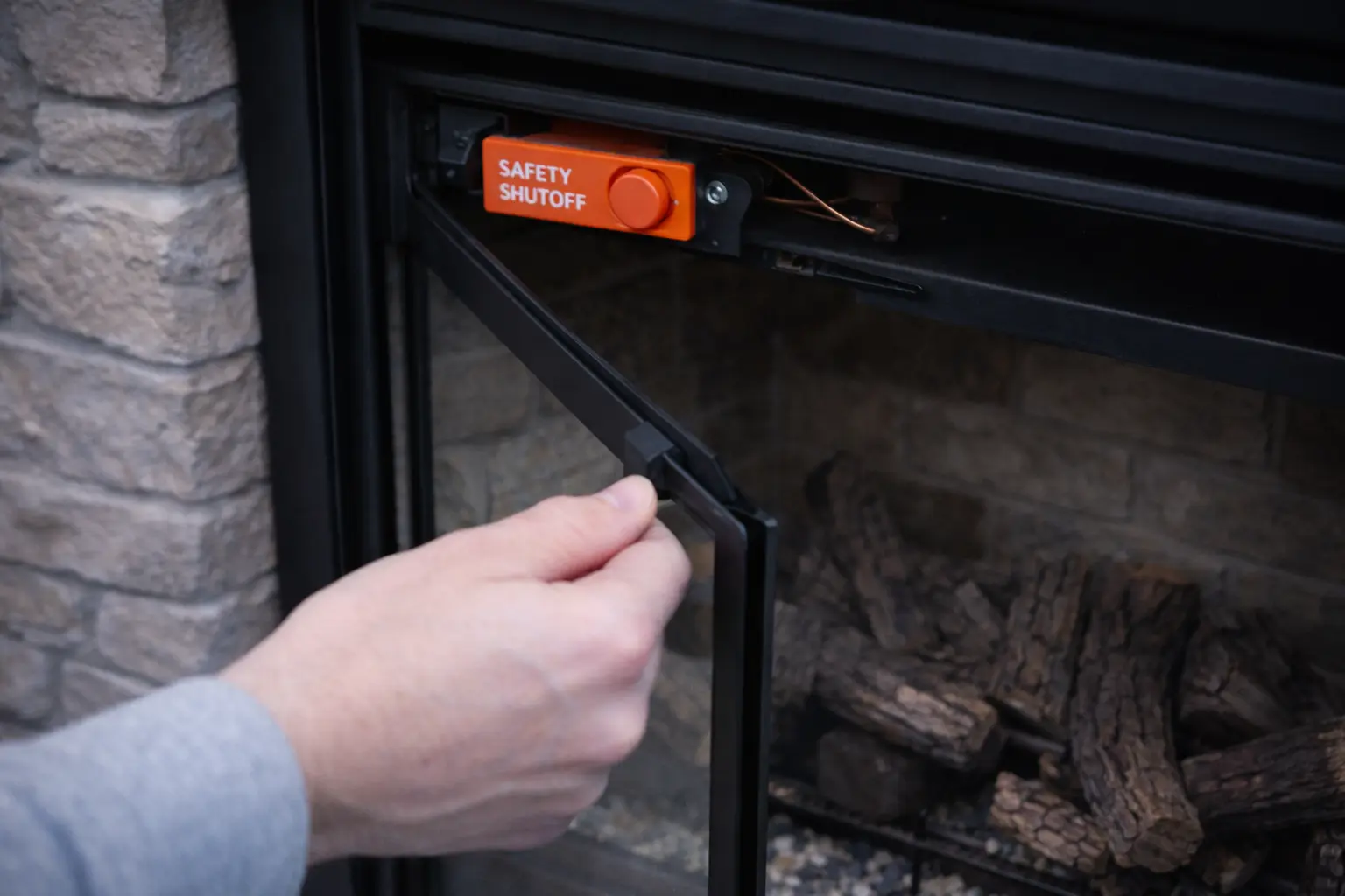 Fireplace safety latch installed